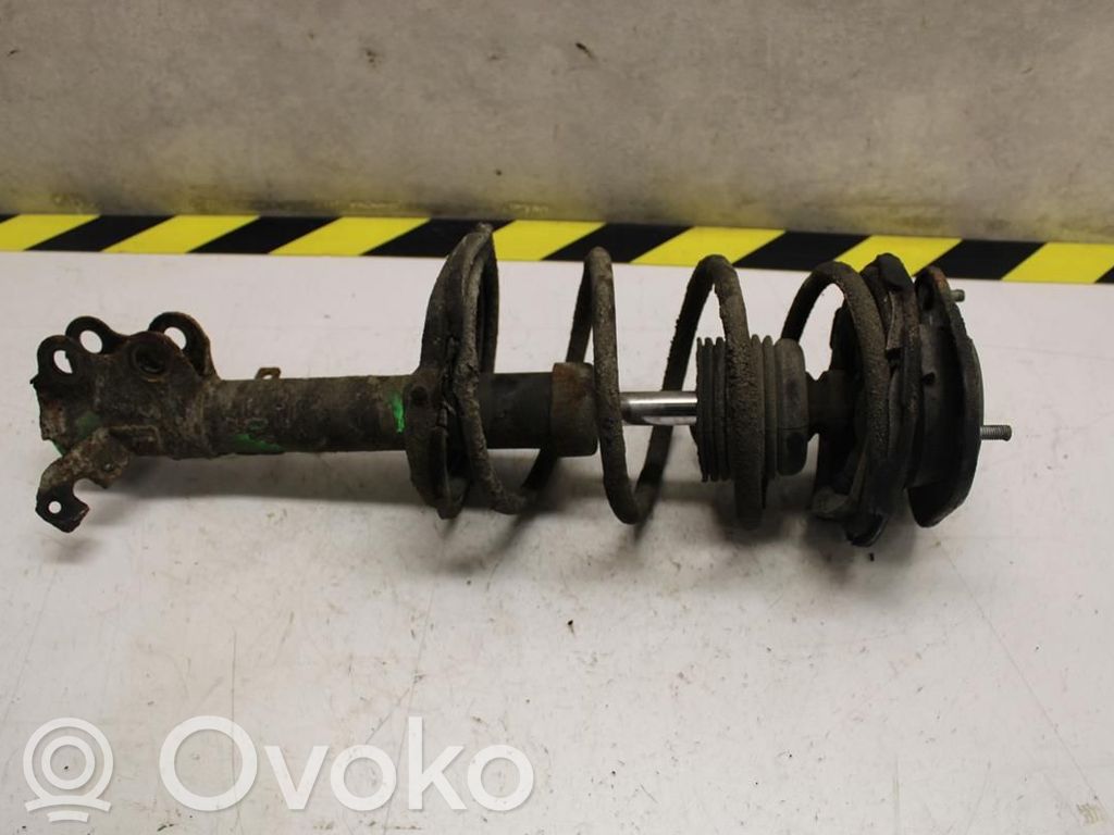 Toyota Corolla E110 Priekšpusē amortizators ar atsperi 
