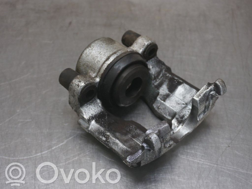 Opel Astra G Zacisk hamulcowy przedni 