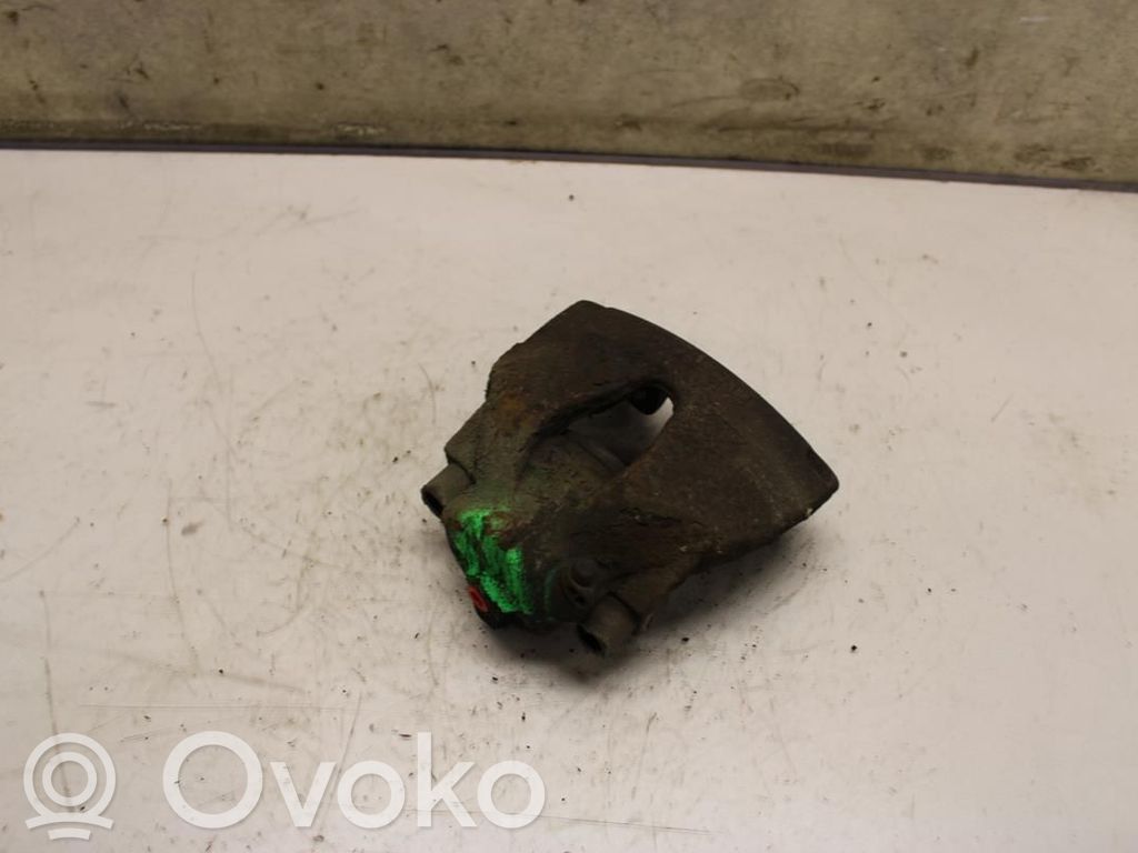 Opel Astra H Zacisk hamulcowy przedni 