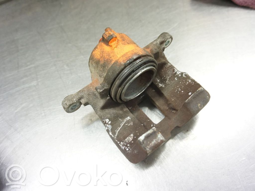 Nissan Almera N16 Front brake caliper 
