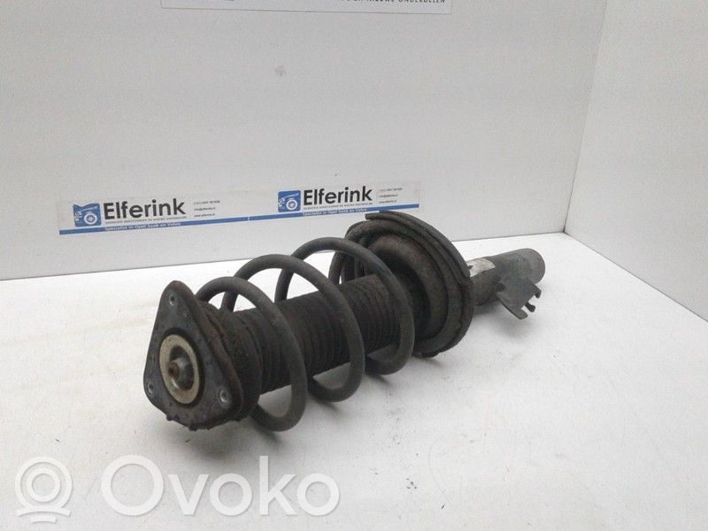 Front shock absorber with coil spring