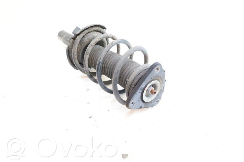 Front shock absorber with coil spring