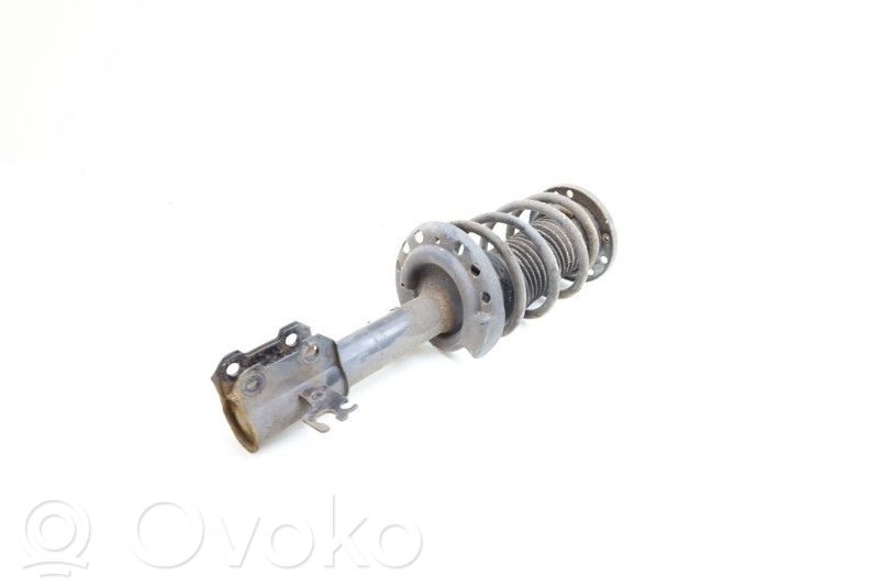 Front shock absorber with coil spring