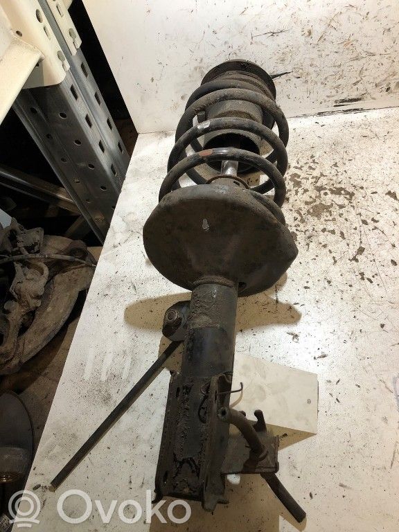 Front shock absorber with coil spring
