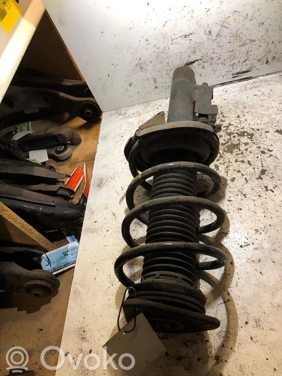 Front shock absorber with coil spring
