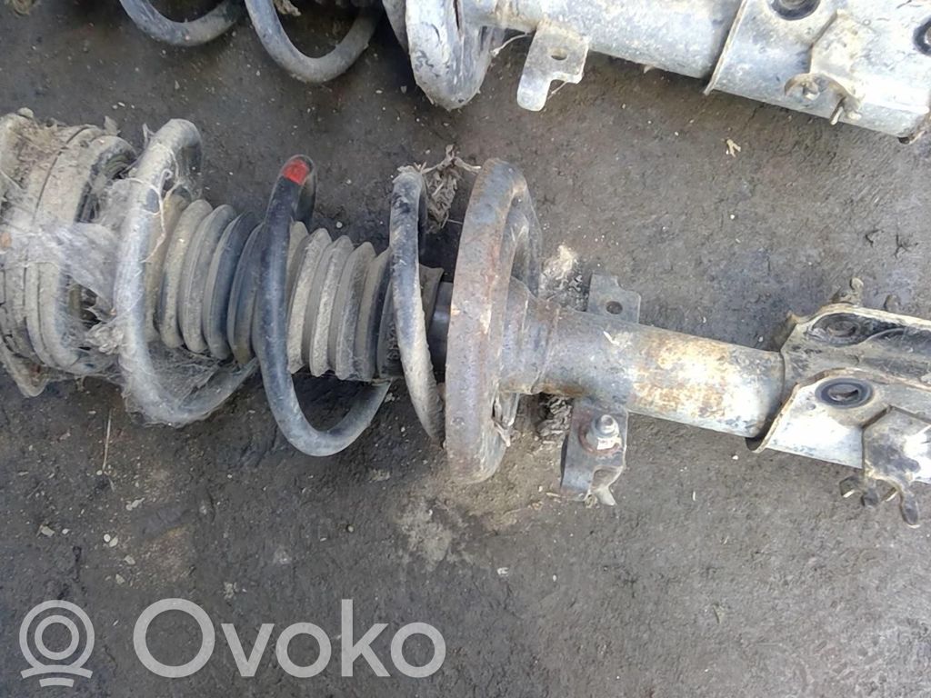Renault Laguna III Amortyzator osi przedniej ze sprężyną 