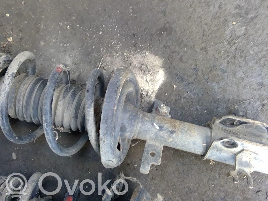 Renault Laguna III Amortyzator osi przedniej ze sprężyną 