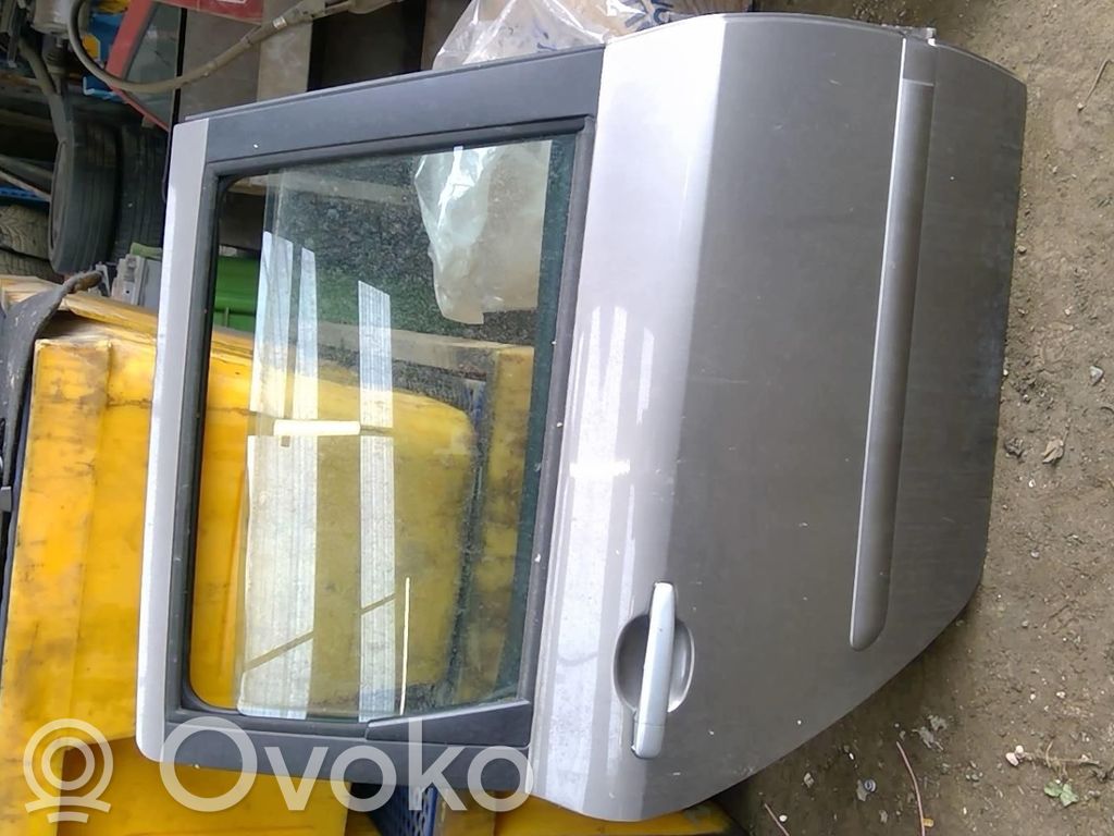 Puerta trasera   9008H7