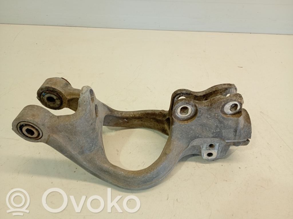 Opel Astra J Dolny wahacz przedni 
