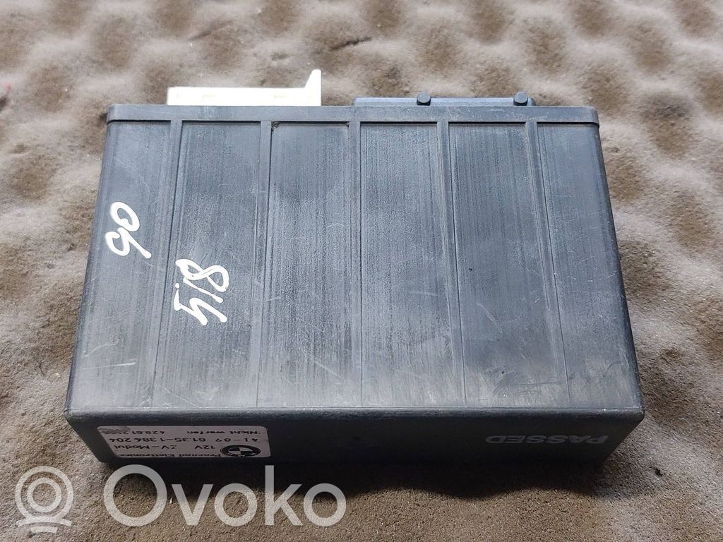 BMW 5 E34 Komforto modulis 