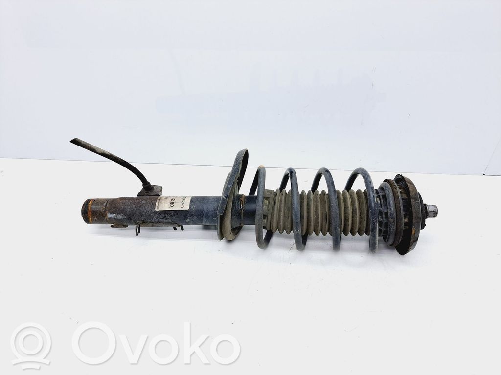 Front shock absorber with coil spring