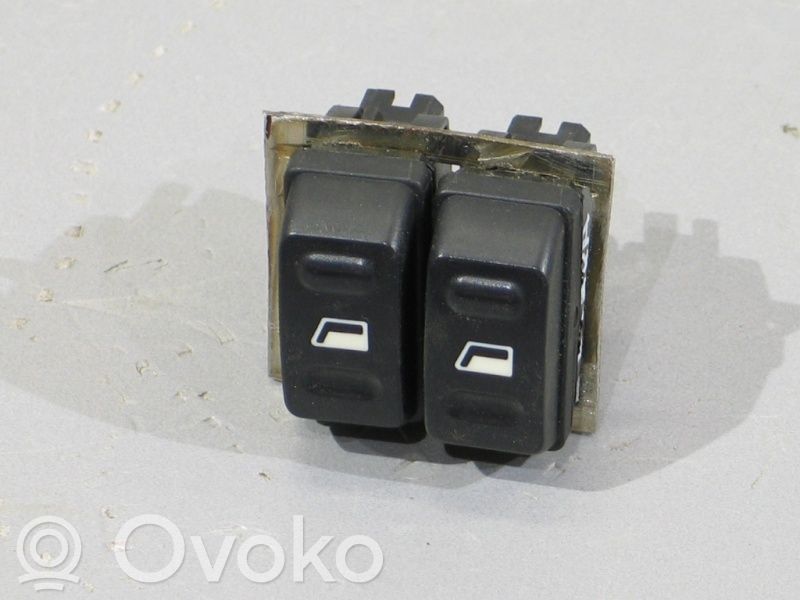 Electric window control switch   6552TA