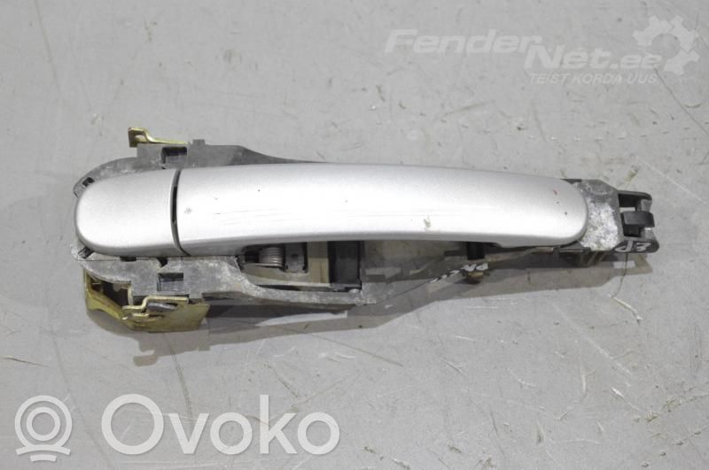 Volkswagen PASSAT B5 Manecilla/asa externa de la puerta delantera 