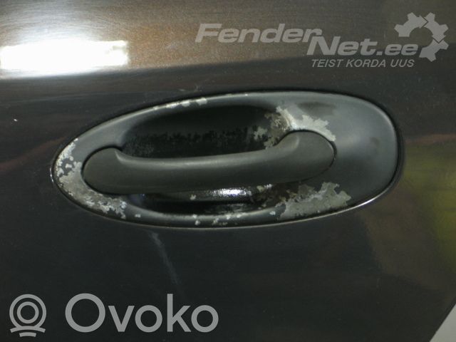 Saab 9-3 Ver2 Takaoven ulkokahvan kehys 