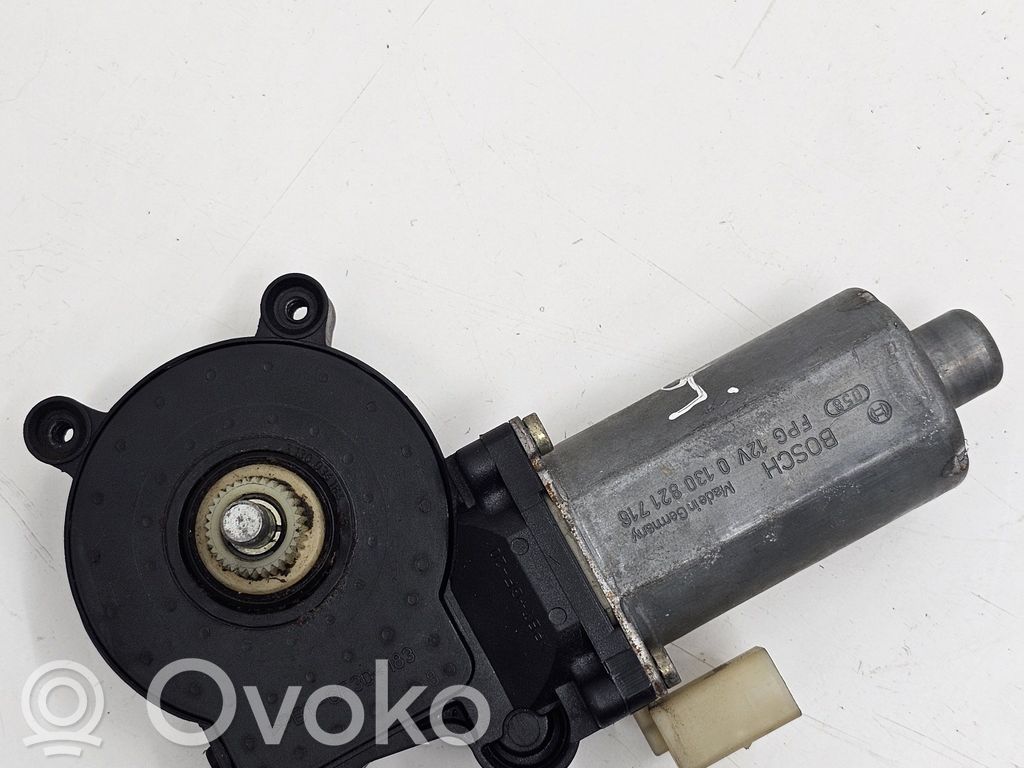 BMW 3 E46 Priekšpusē loga pacēlāja motoriņš 