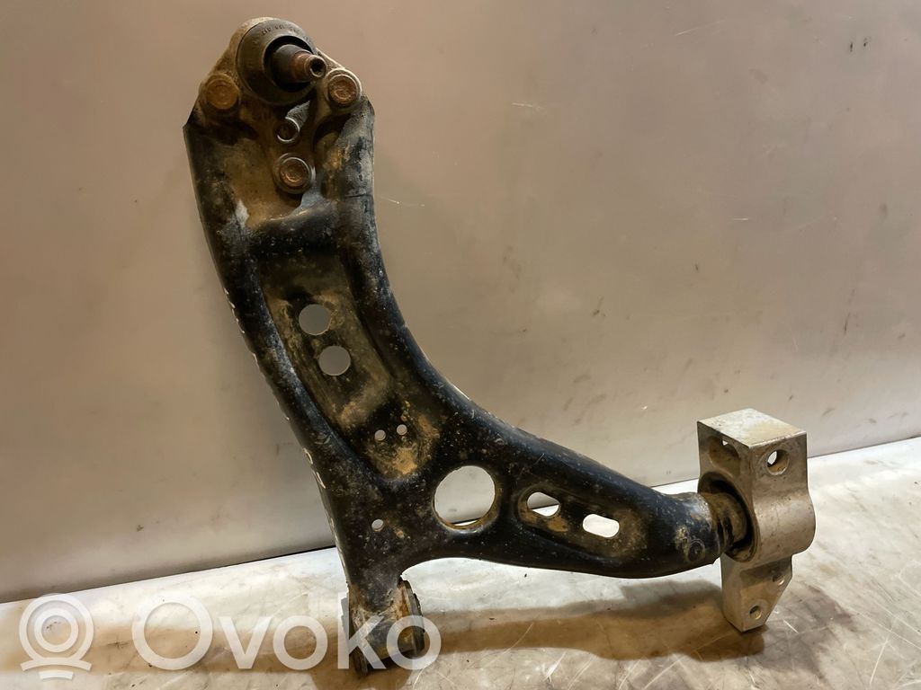 Volkswagen PASSAT B7 Brazo de suspensión/horquilla inferior delantero 