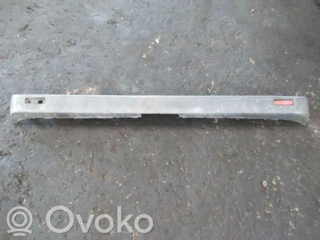Renault Trafic II (X83) Moldura inferior del parachoques trasero 