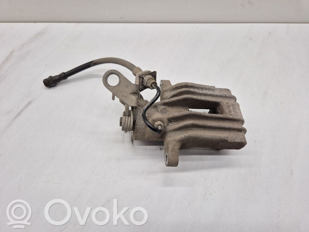 Volkswagen Golf V Tylny zacisk hamulcowy 