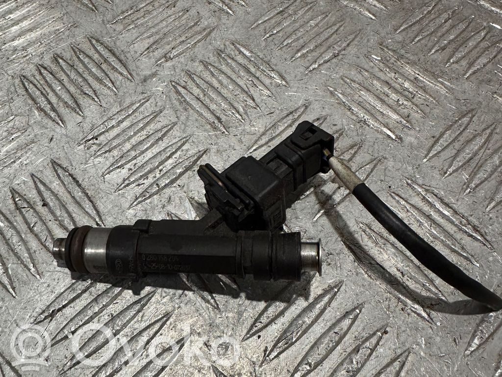 Opel Astra J Inyector de combustible 