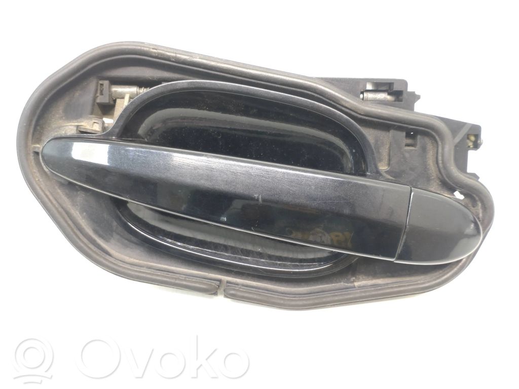 Manecilla externa puerta trasera   7034543,51217034543,51217034543