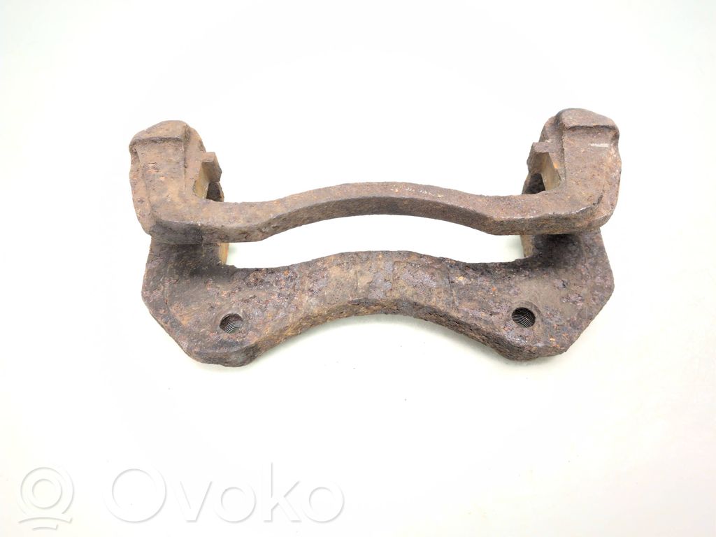 Plaquette / support d'étrier avant
