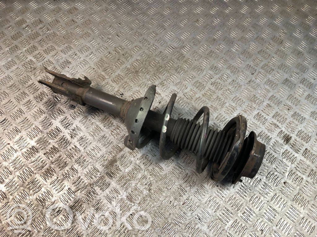 Front shock absorber with coil spring