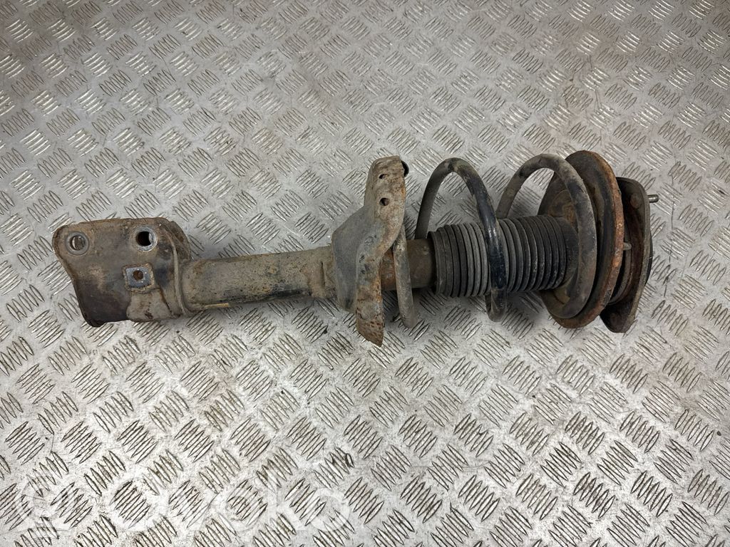 Subaru Outback Front shock absorber with coil spring 