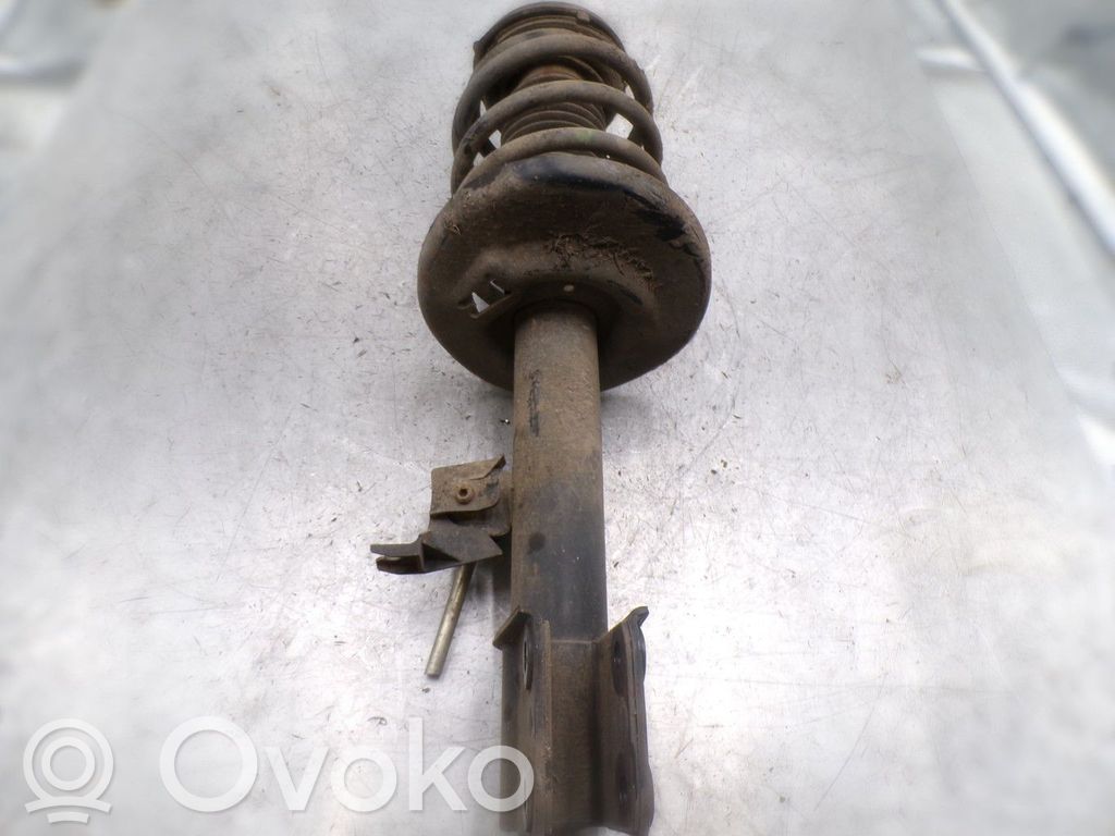 Front shock absorber with coil spring
