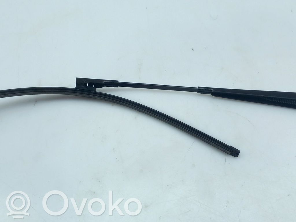 Front wiper blade arm