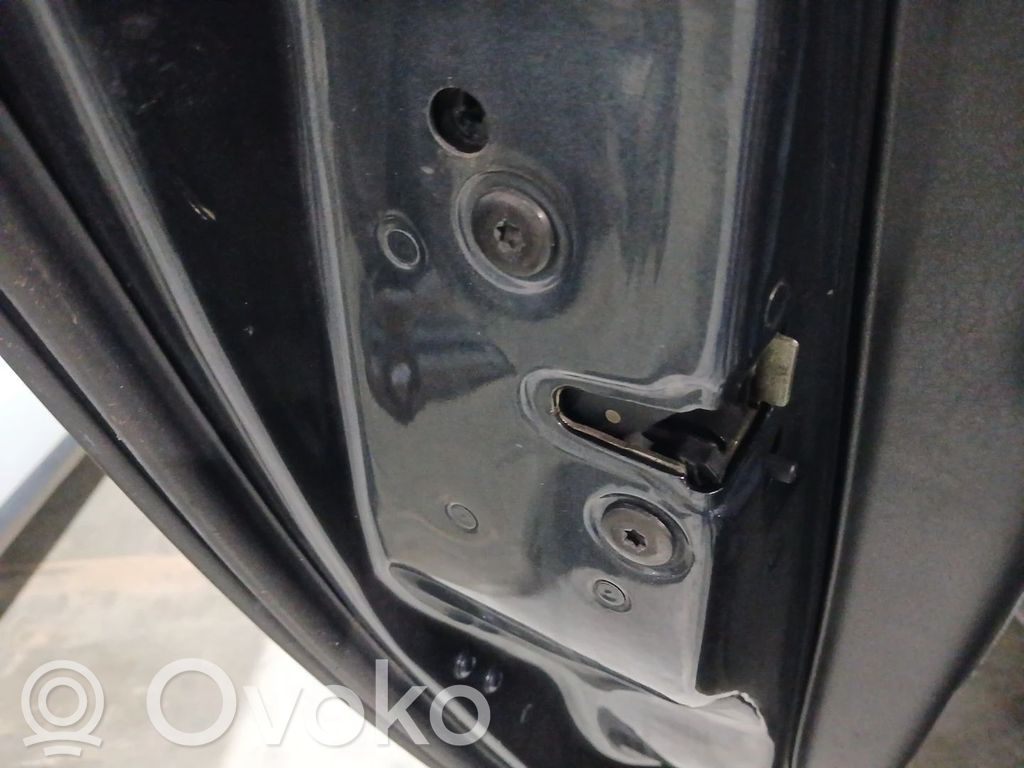 Cerradura de puerta trasera