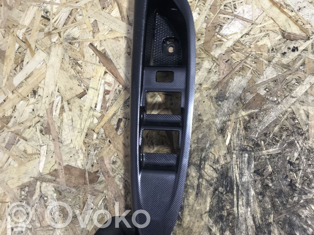 Mazda MPV Front door window switch trim 