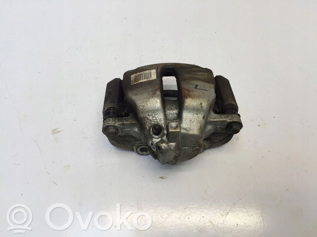 Opel Corsa F Front brake caliper 