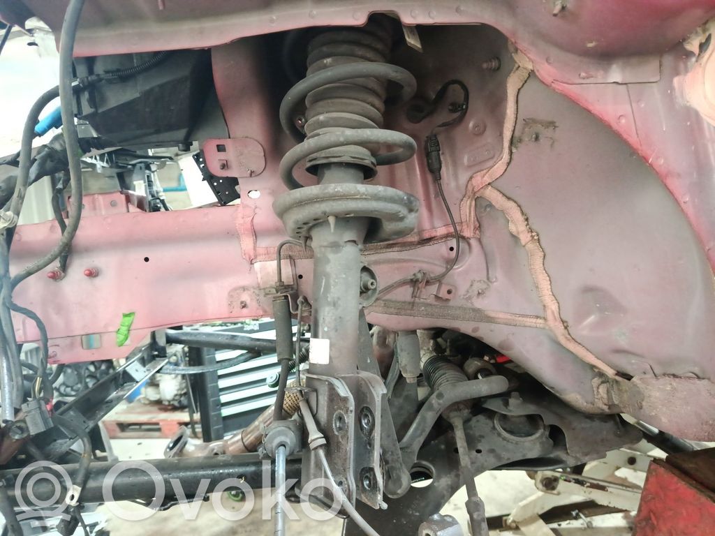Front shock absorber with coil spring   68257665AB