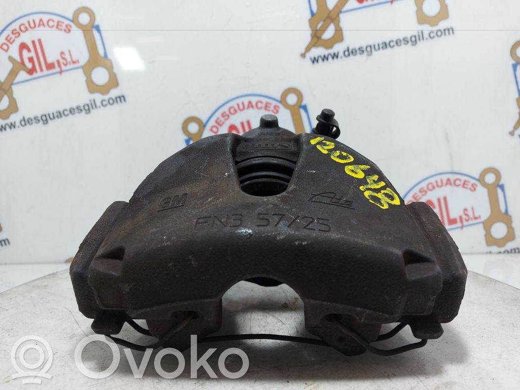 Opel Astra H Zacisk hamulcowy przedni 