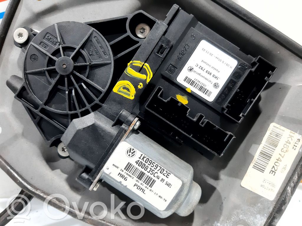 Volkswagen Golf V Front door window regulator with motor 