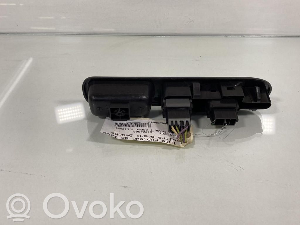 Electric window control switch   6554E9