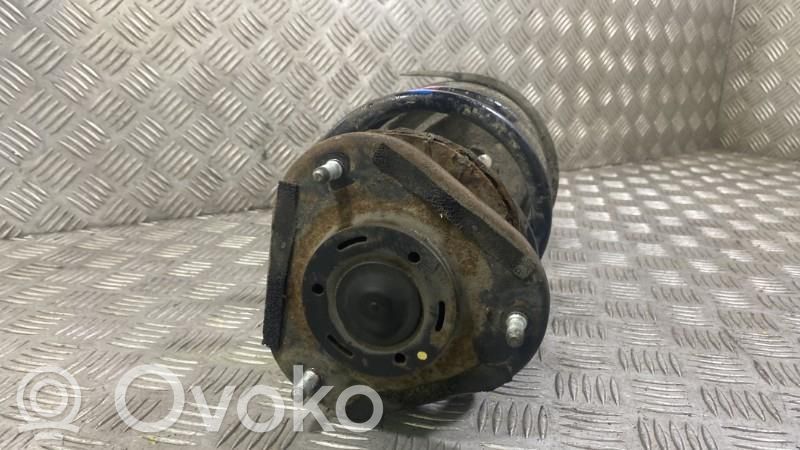 Toyota Avensis T250 Amortiguador delantero con muelle espiral 