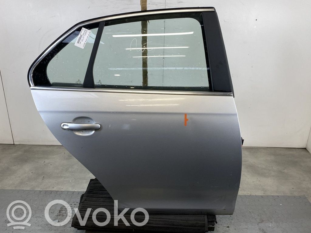 Volkswagen Jetta V Puerta trasera 