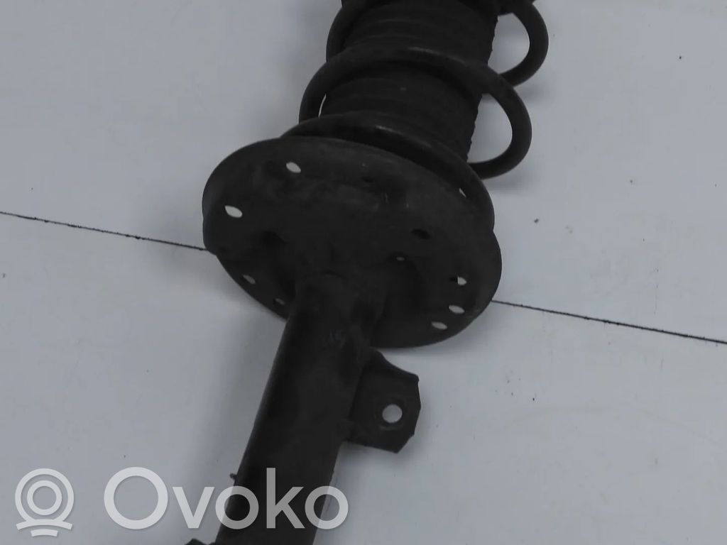 Opel Corsa D Priekšpusē amortizators 