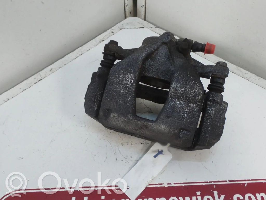 Opel Combo D Front brake caliper 