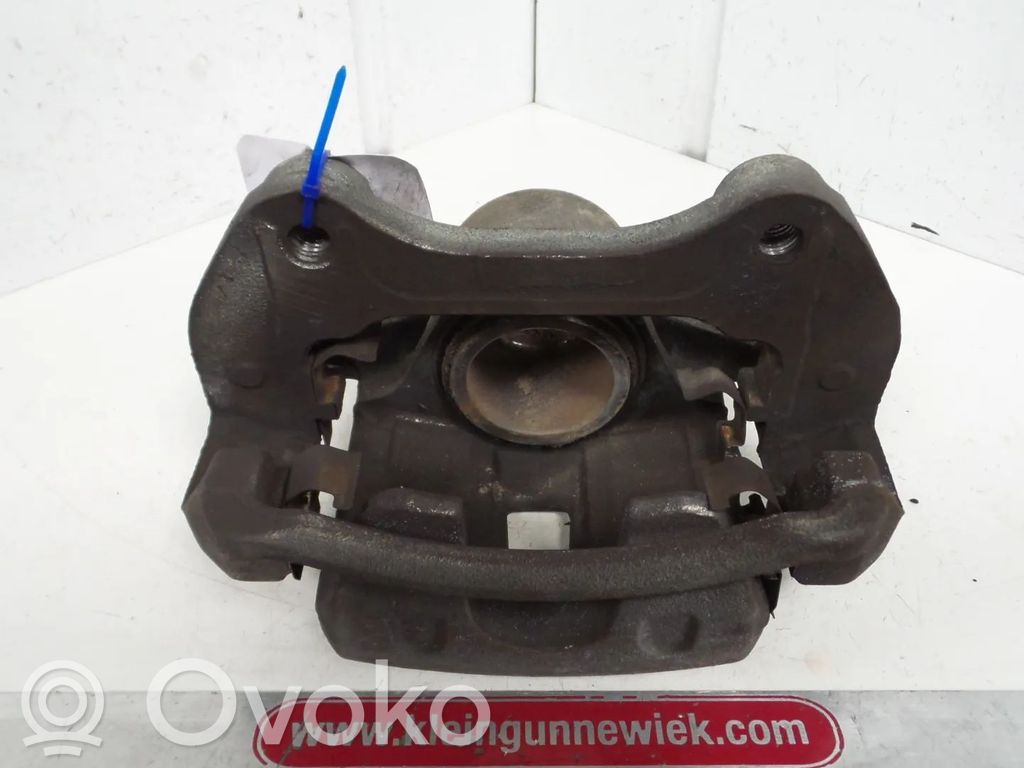 Opel Astra J Zacisk hamulcowy przedni 