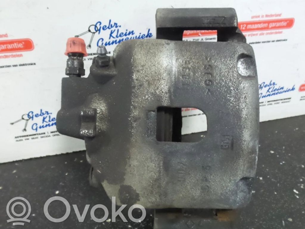 Opel Corsa E Front brake caliper 