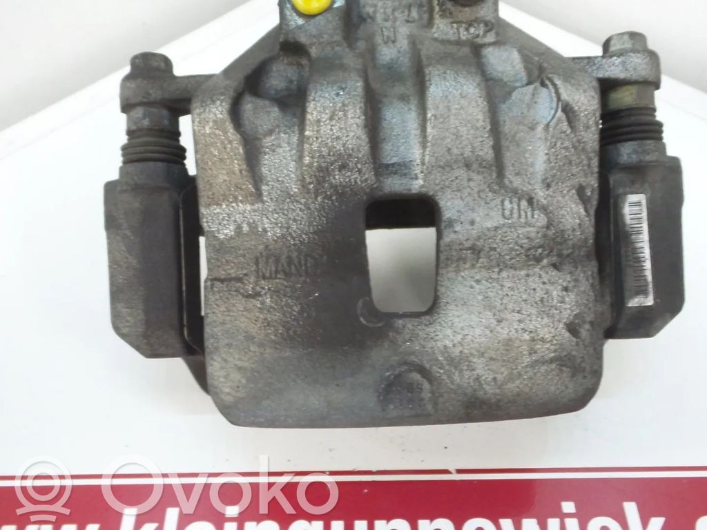 Opel Insignia A Zacisk hamulcowy przedni 