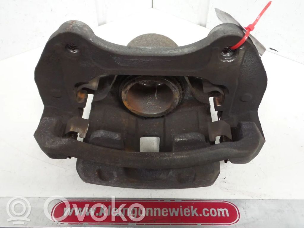Opel Astra J Caliper de freno delantero 