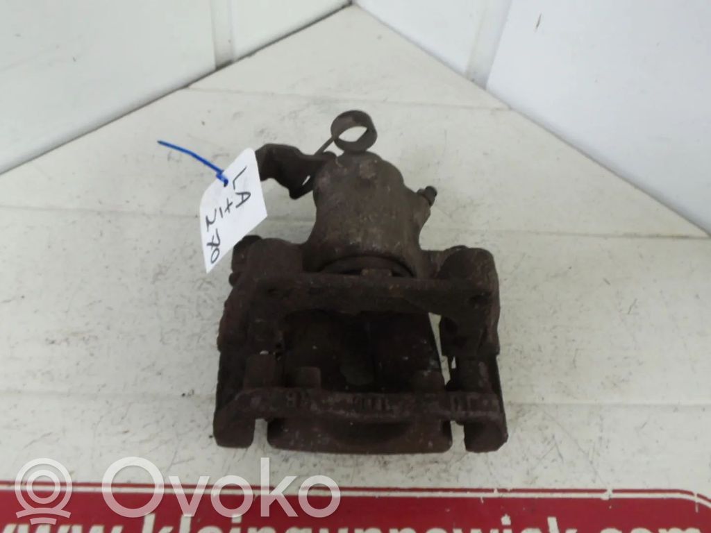 Opel Astra H Tylny zacisk hamulcowy 