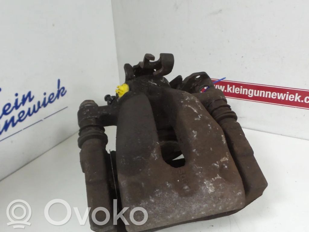 Opel Astra H Tylny zacisk hamulcowy 