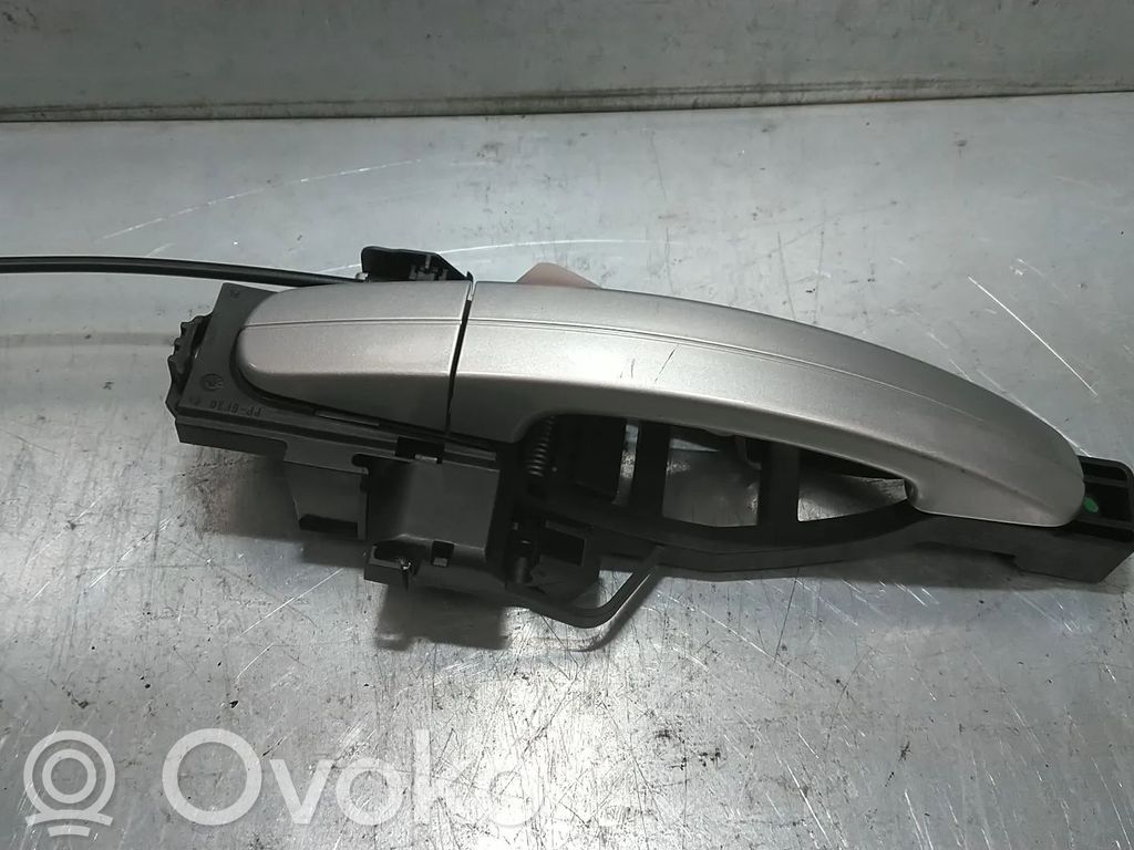Tapa manecilla puerta trasera   BM51A224A36CG