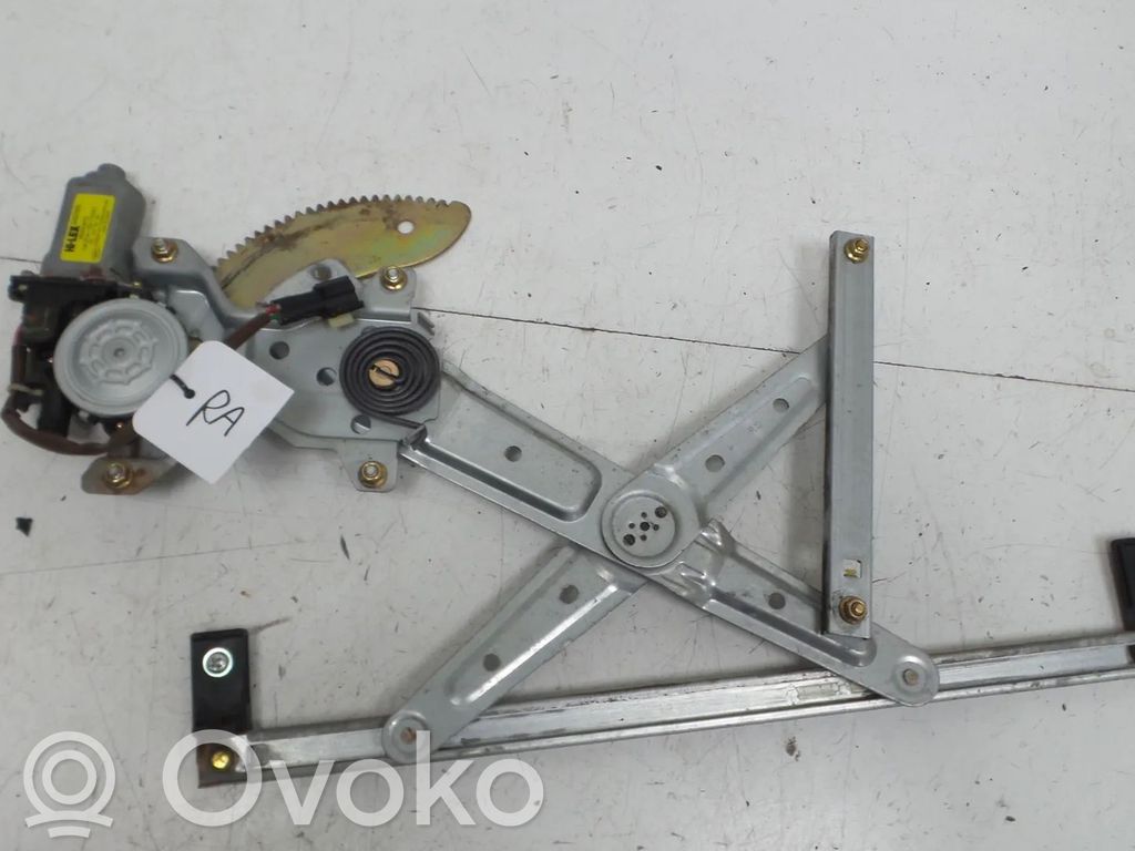 KIA Carens I Motorino alzacristalli della portiera anteriore 