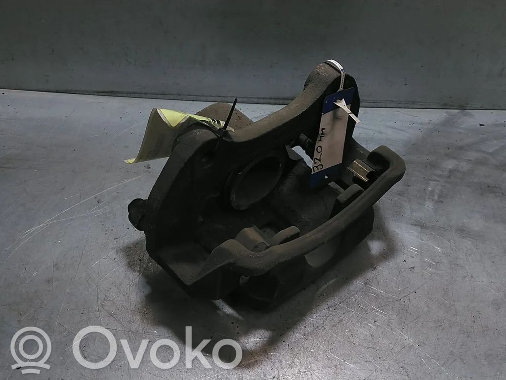 Opel Astra J Zacisk hamulcowy przedni 