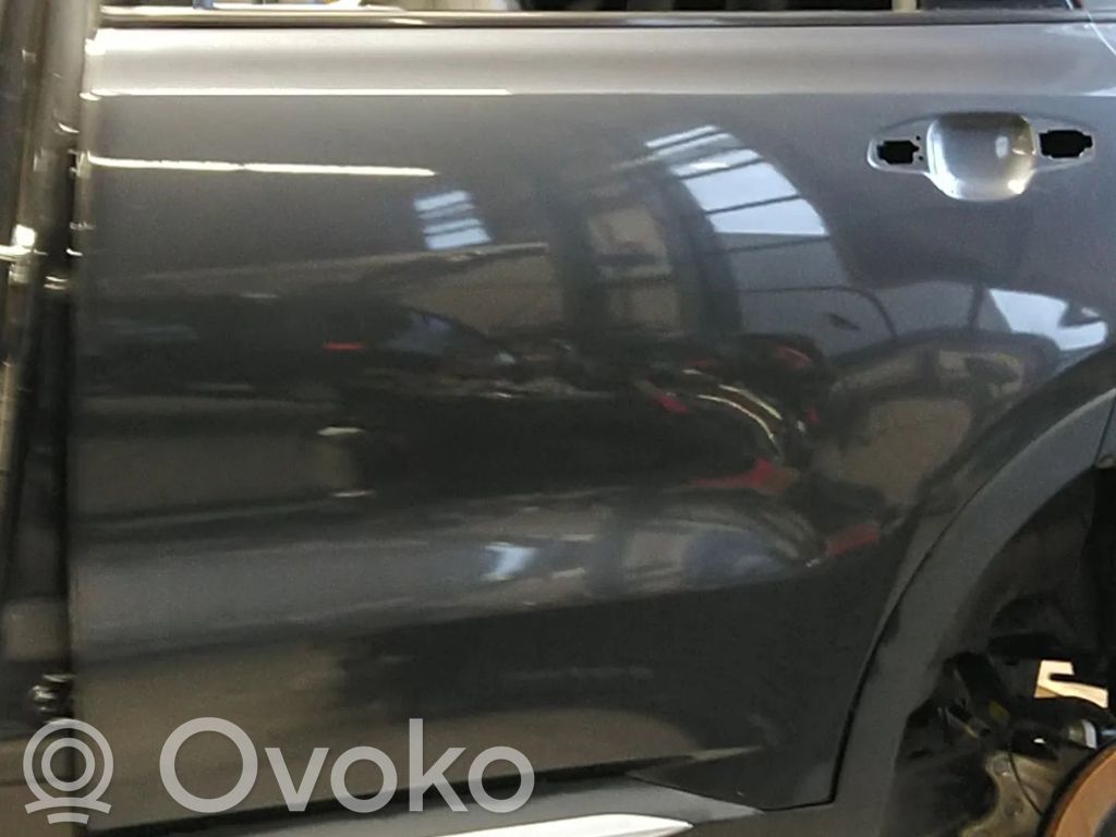 Puerta trasera   77003P2010